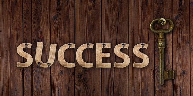 The word "success" with a key next to it.