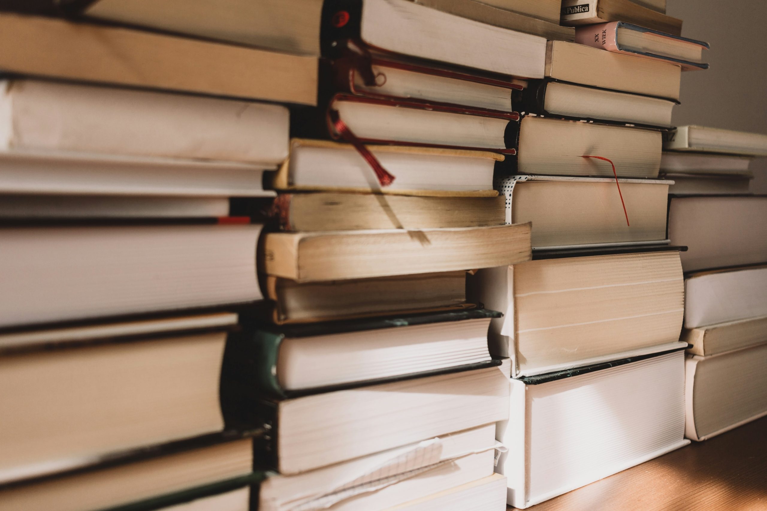 Books stacked on top of each other. 