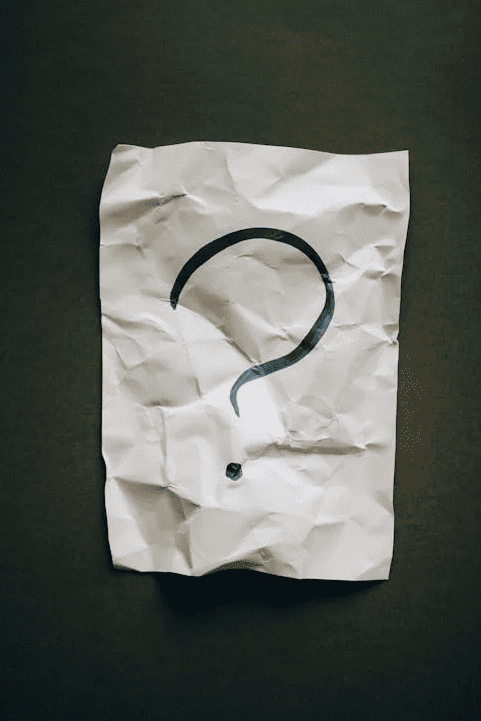 A question mark on a crumpled up piece of paper. 