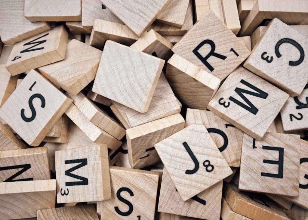 Brown scrabble board letters. 