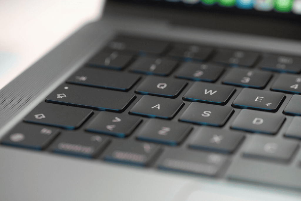 A close up of a keyboard on a laptop