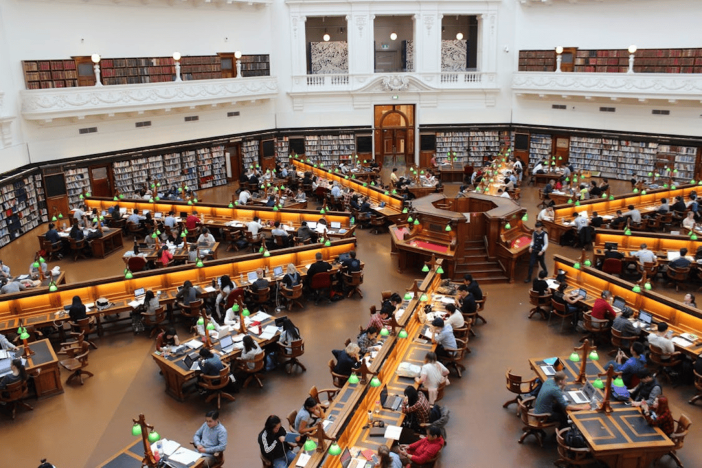 College students working in a library. 