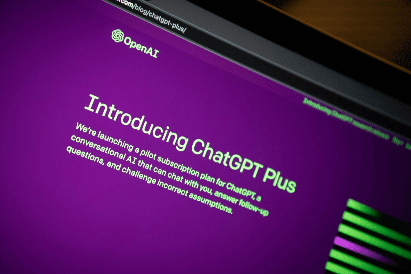 A close up of a computer screen displaying the ChatGPT Plus website.