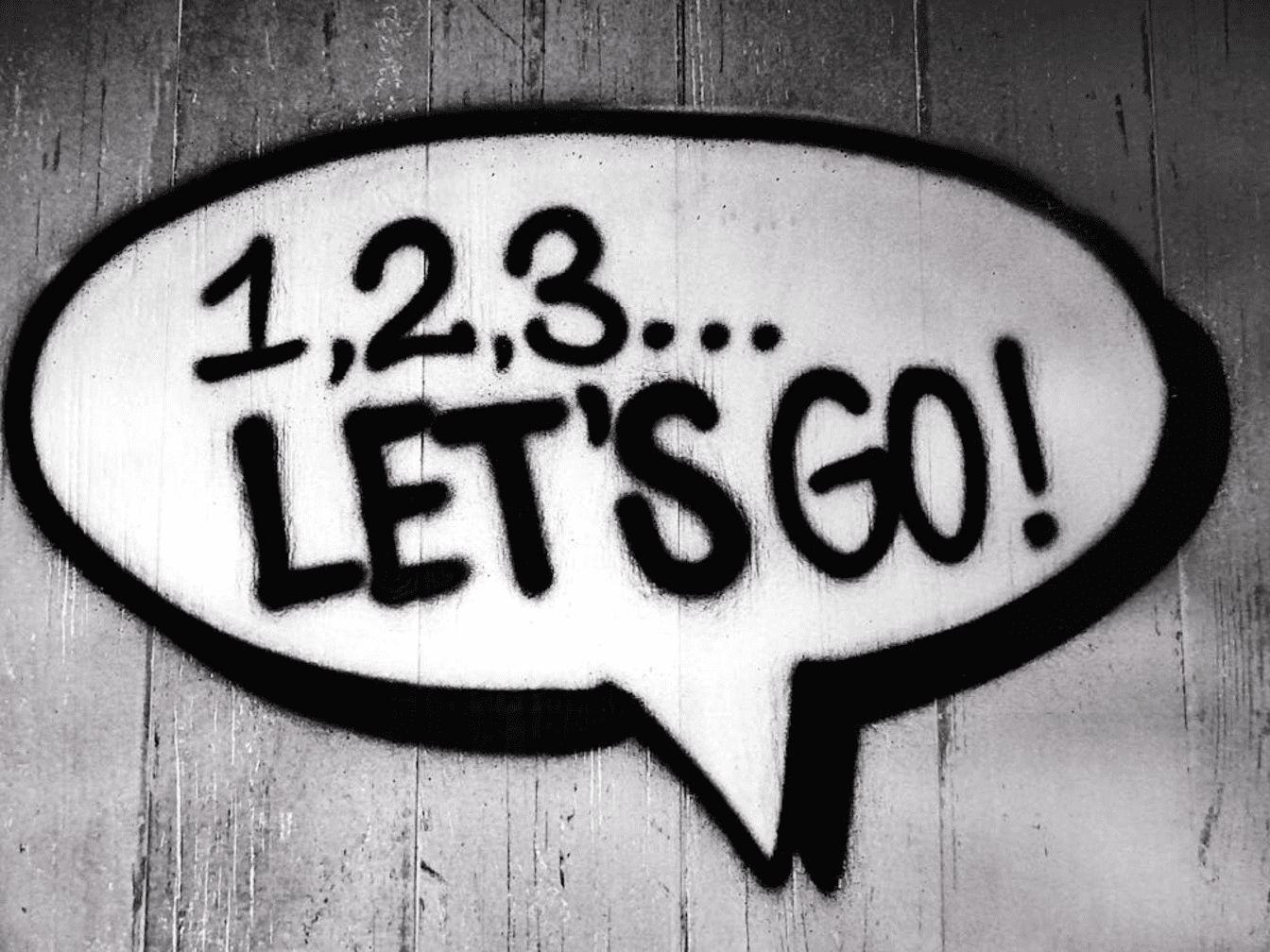 The phrase " 1,2,3... Let's Go!" in a chat bubble graphic. 