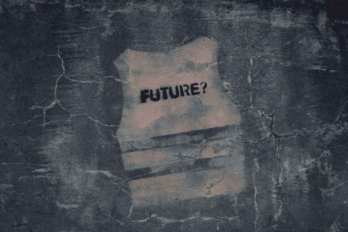 The word "future?" on a black surface.