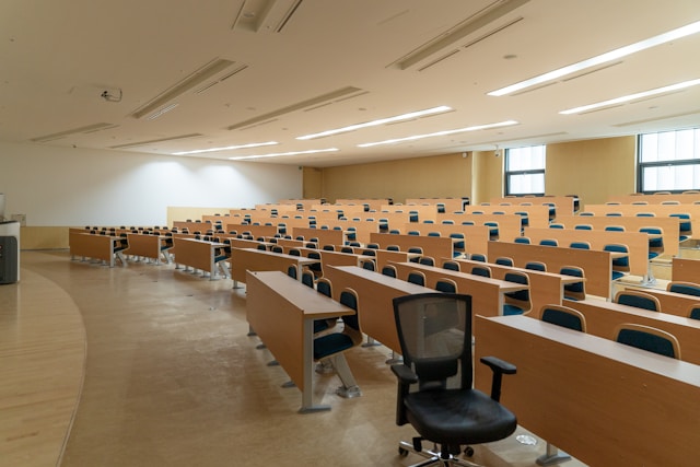 University lecture theatre with chairs and tables 