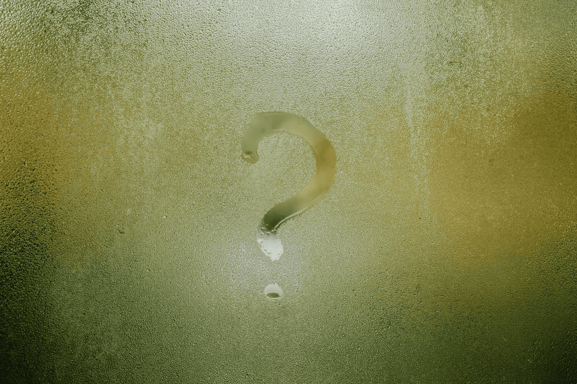 A question mark on a window. 