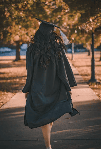 A college student wearing a graduation gown.