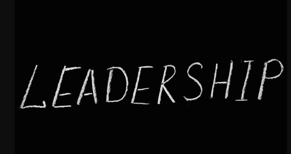 The word "Leadership" written in white letters on a black background. 