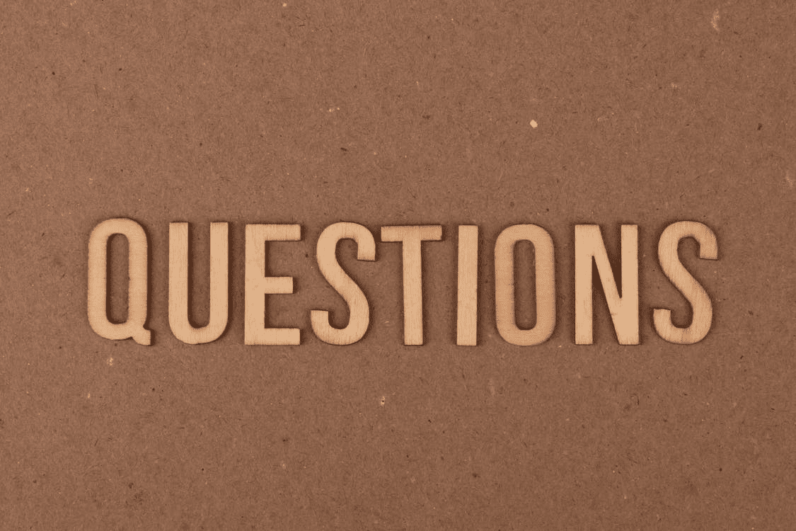 The word "Questions" with a brown background. 