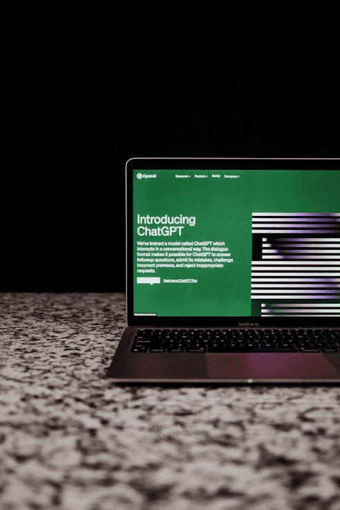 A laptop showing an AI tool on the screen. 