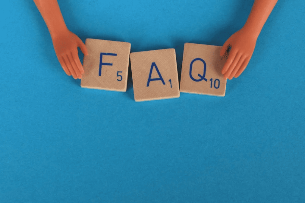 Tiles that show the acronym "FAQ" with a blue background. 