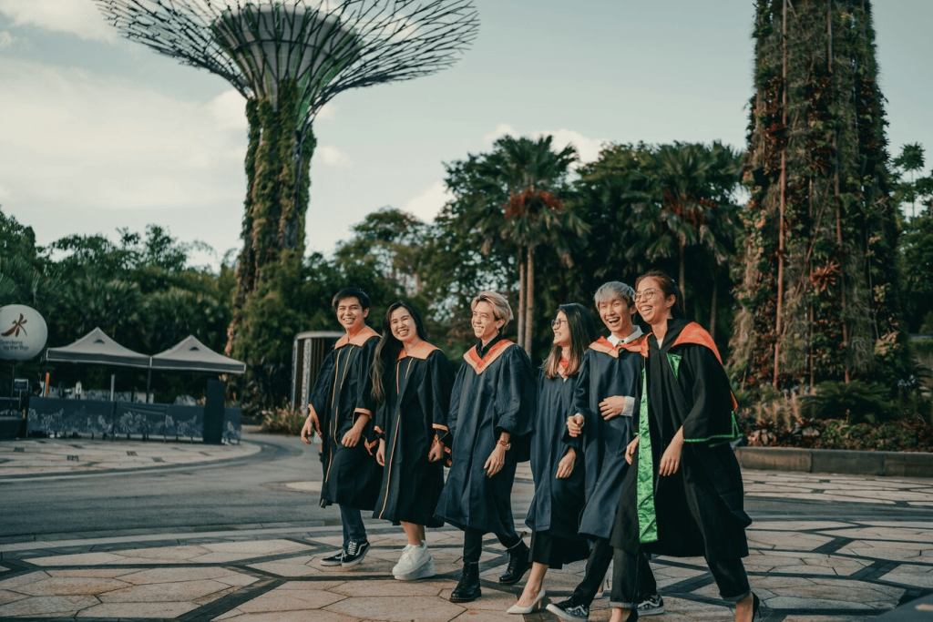 A group of college students wearing graduation gowns.