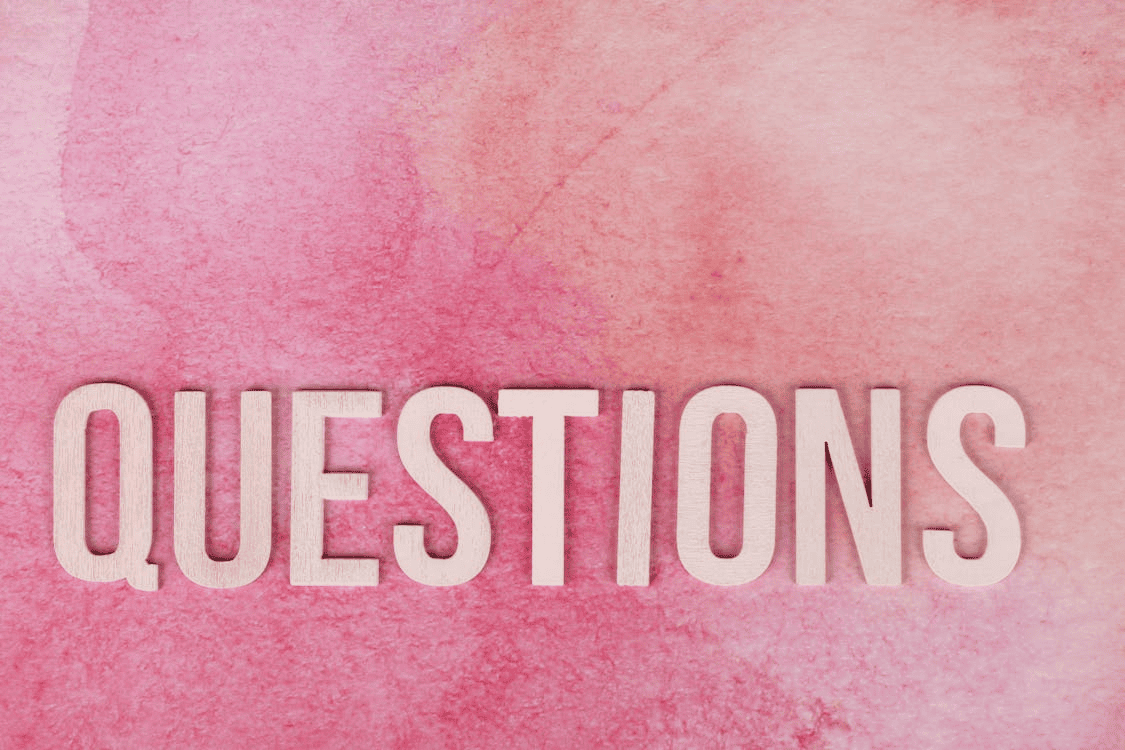 The word "questions" on a pink background.