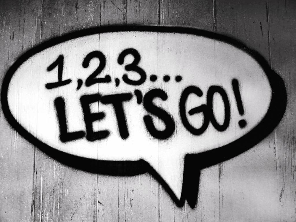 A chat bubble with the phrase "1,2,3... Let's Go!"